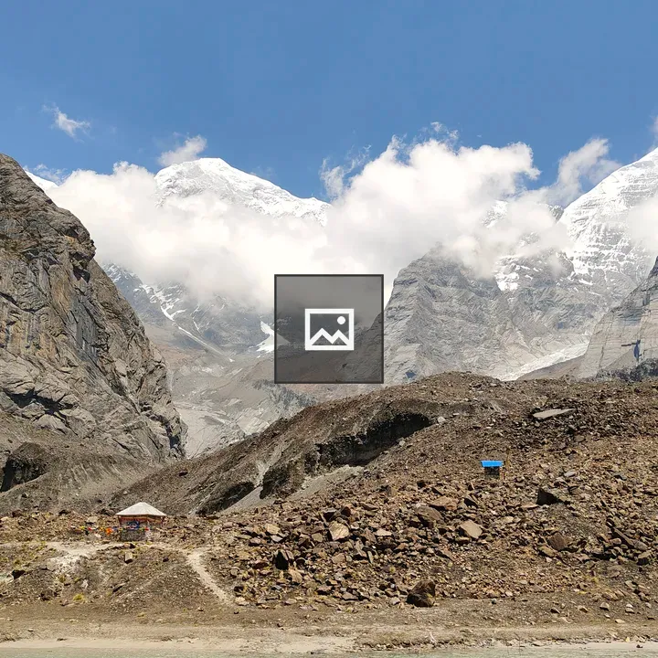 Blue lake with snow-capped mountains
