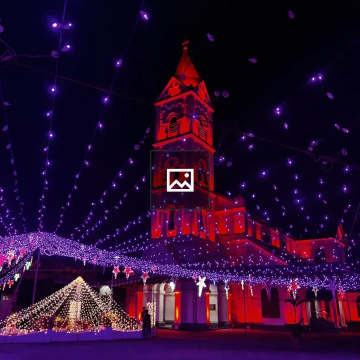 Church Tower at Night with Red Illumination