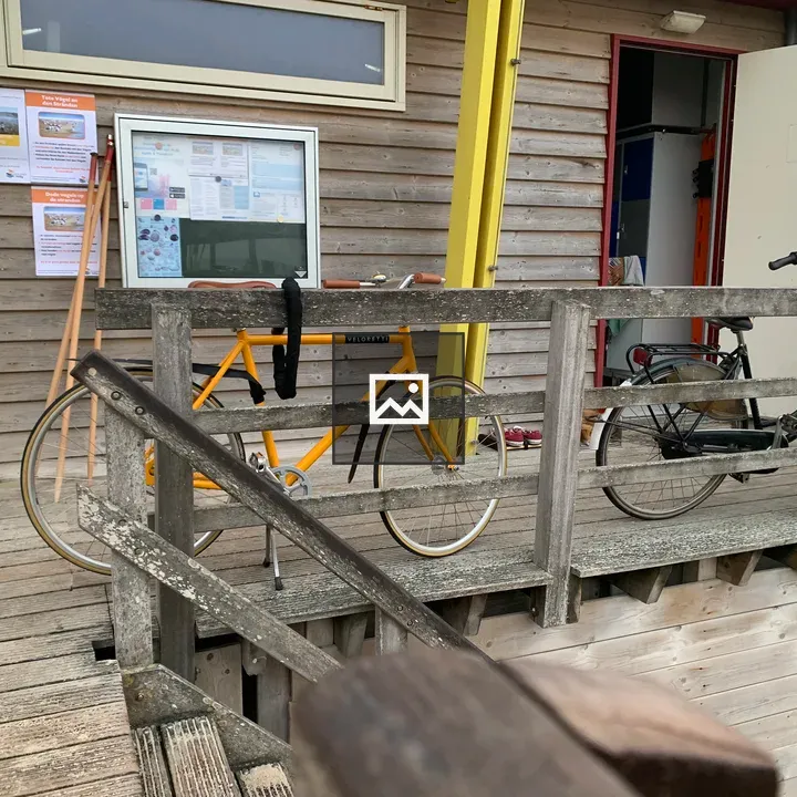 Two bicycles at a pier