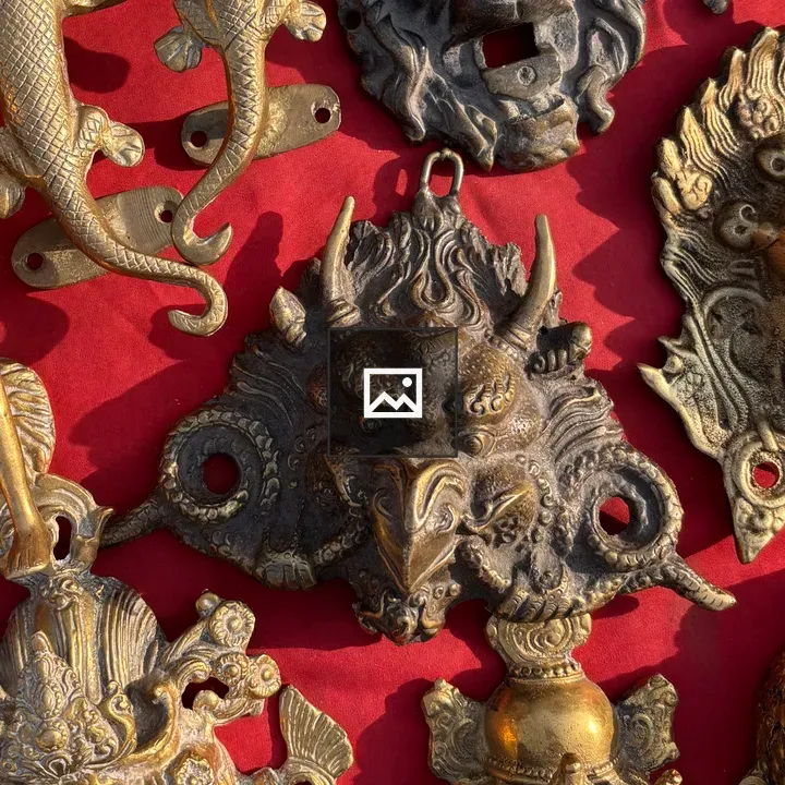 Ornate bronze and brass carvings