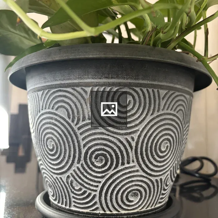 Spiral-decorated plant pot