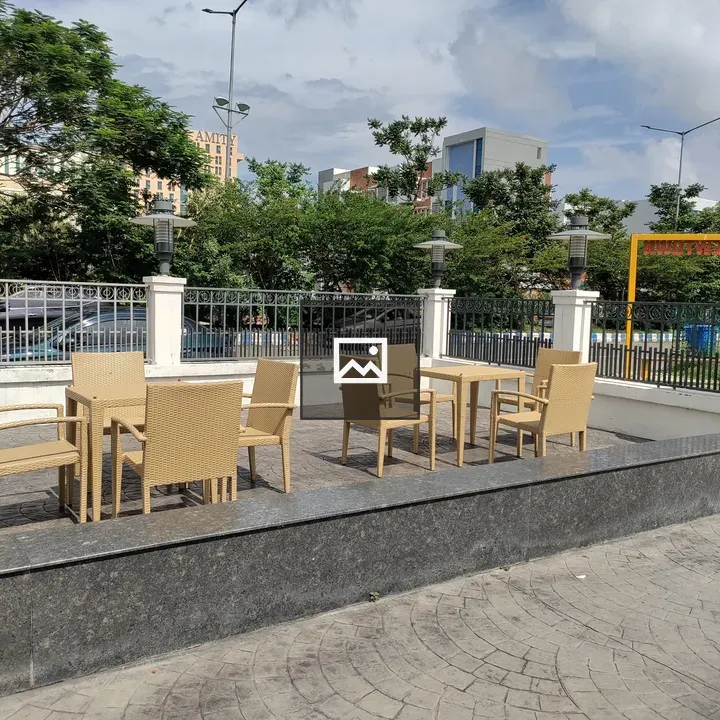 Outdoor patio with brown furniture