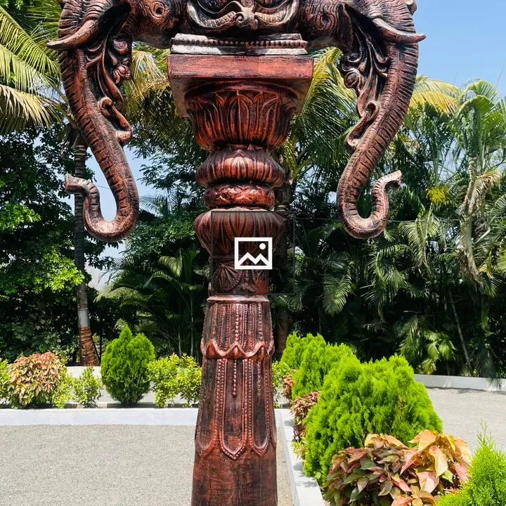 Decorative pillar with elephant heads