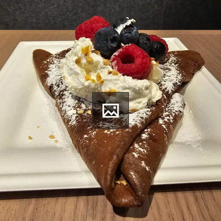 Chocolate crepe with toppings