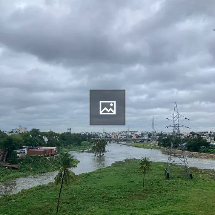 Two Rivers Merging at City Edge