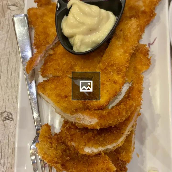 Plate of breaded chicken strips
