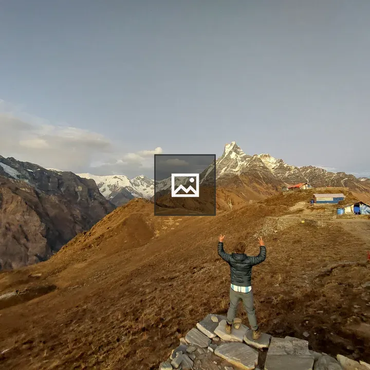 Person on Rocky Outcrop at Mardi Basecamp