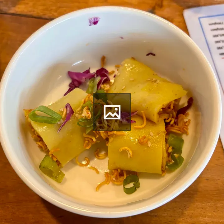 Dumplings in White Bowl