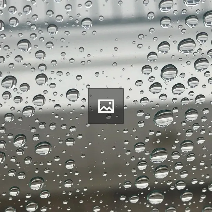 Water Drops on Gray Surface