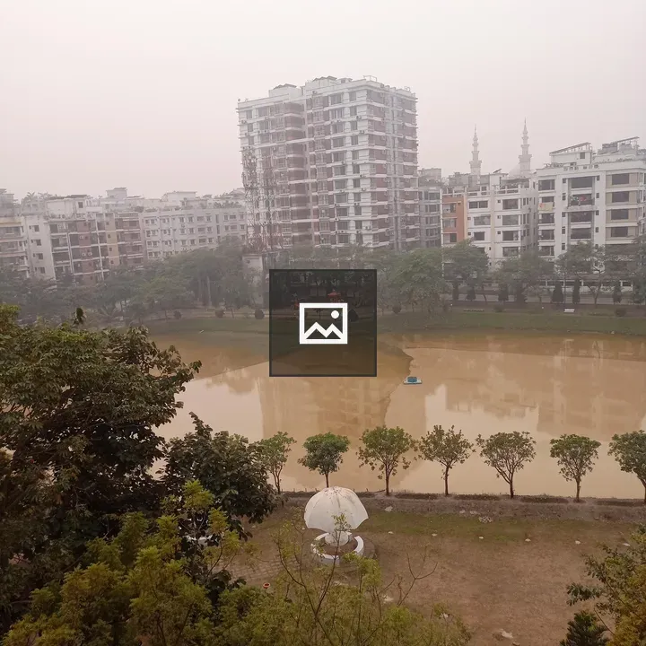 Cityscape with Residential Buildings by Pond