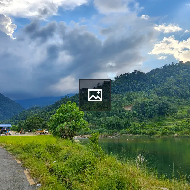 Scenic Water with Green Hills