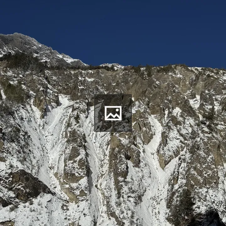 Snow-dusted Mountain Slopes