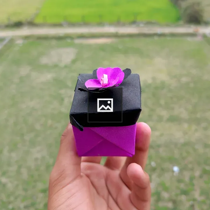 Hand Holding Gift Box