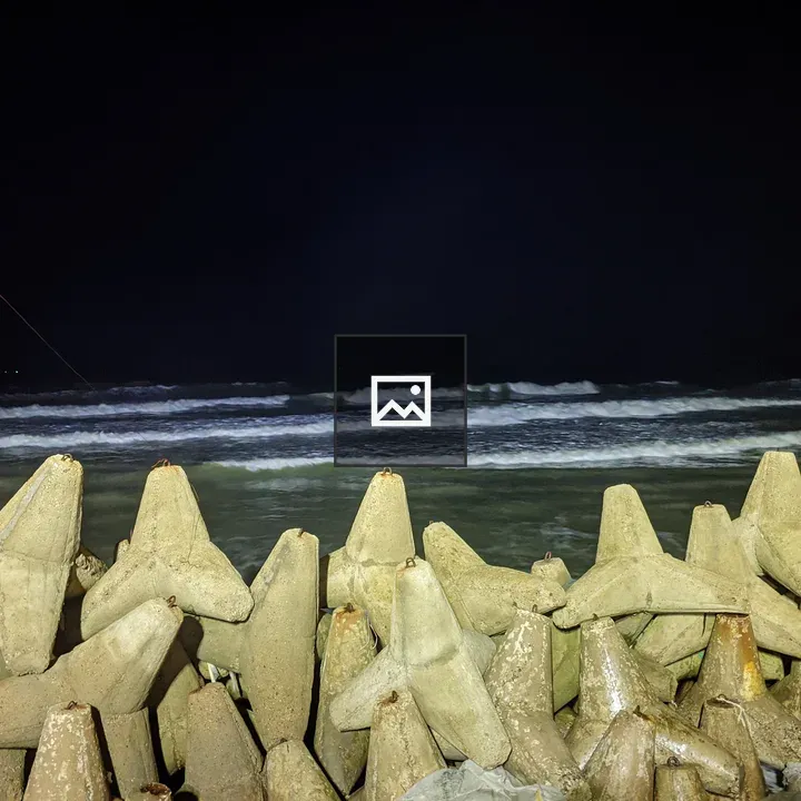 Nighttime beach with tetrapods