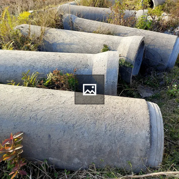 Gray Cylindrical Concrete Pipes