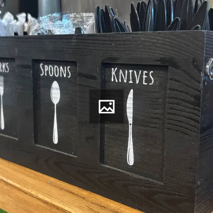 Wooden utensil box with labeled sections