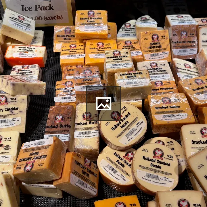 Array of cheeses on display