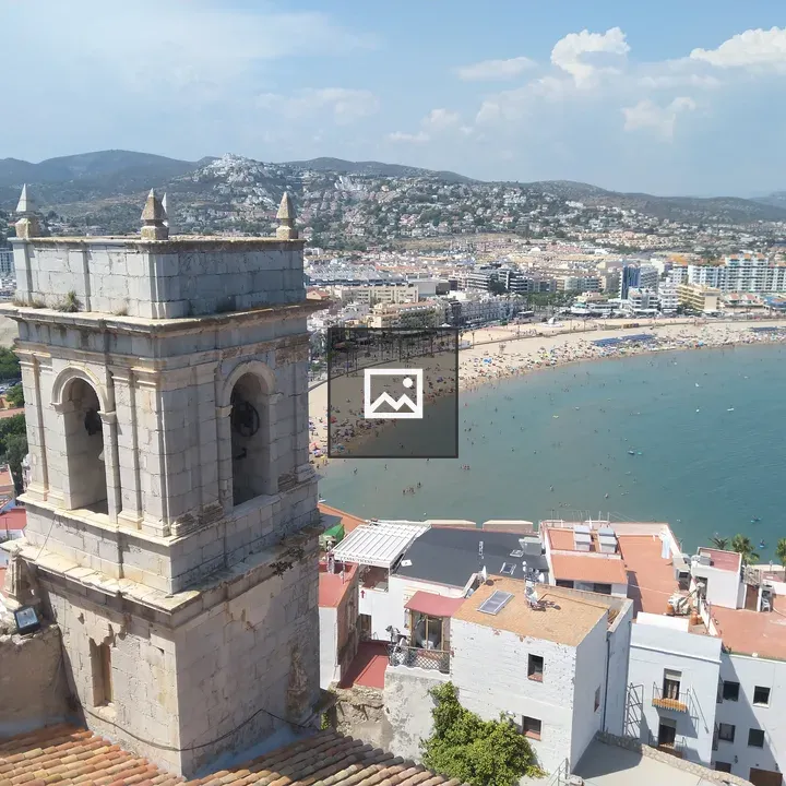 Belltower over Peñíscola beach
