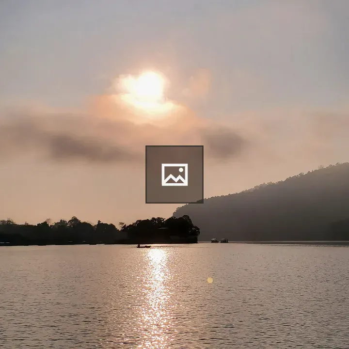 Fewa Lake with Sunlit Cloud Reflections