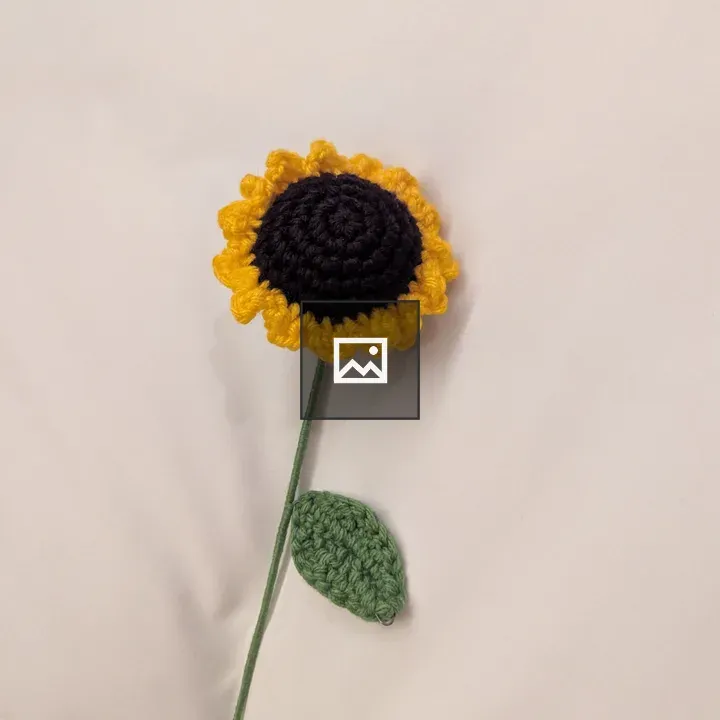 Crocheted Sunflower on Light Background