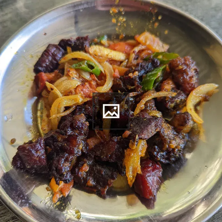 Dish of Fried Meat and Veggies