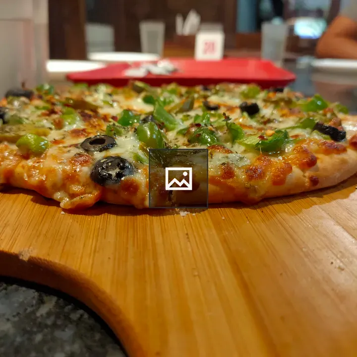 Pizza with Peppers on Board