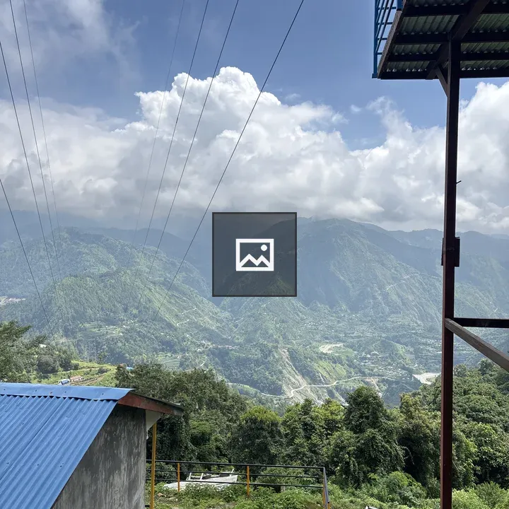 Hillside View with Mountains