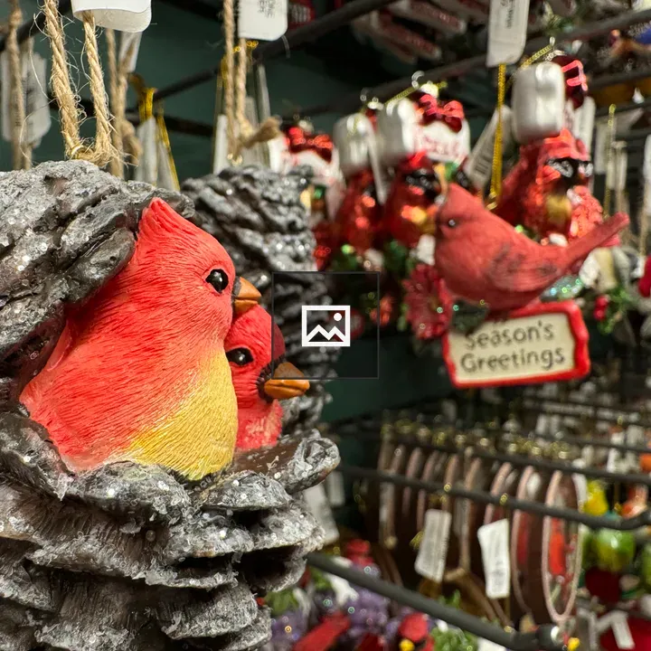 Christmas ornament pine cone with cardinals