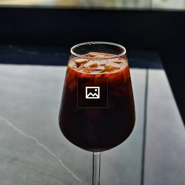 Glass of dark fruit mocktail