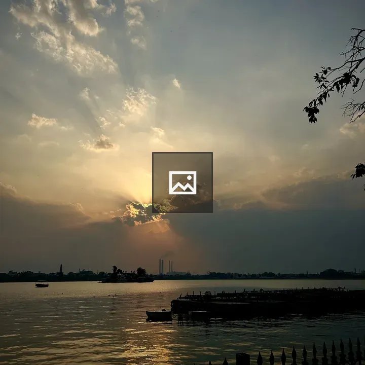 Sunset over tranquil lake
