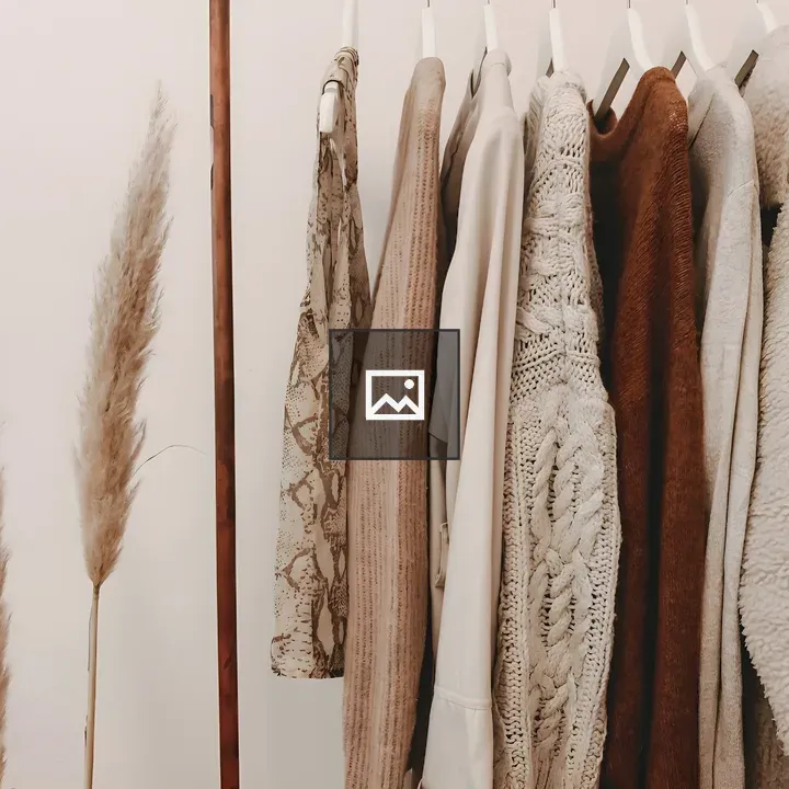 Women’s clothes hanging on wall