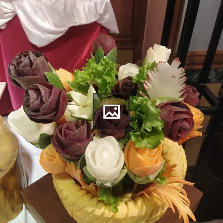 Vegetable flower arrangement in yellow basket