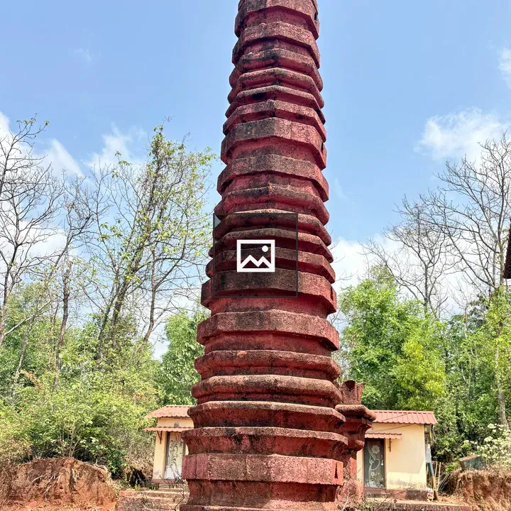 Tall red stone lamp pillar