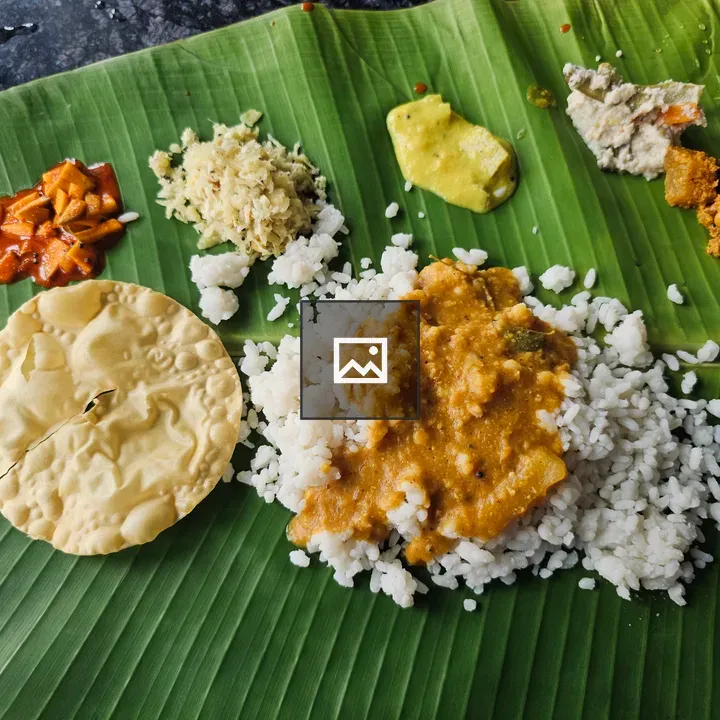 Traditional Kerala meal on banana leaf
