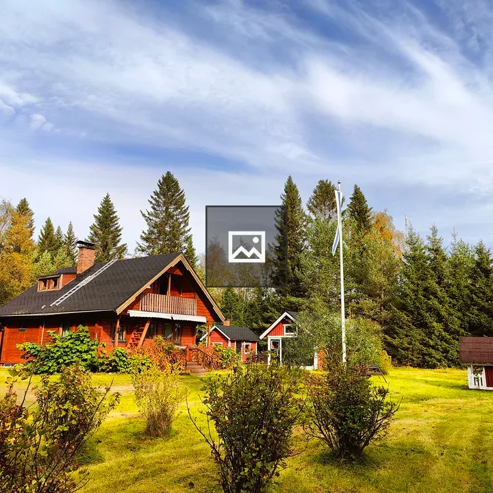 Wooden cabin in lush garden