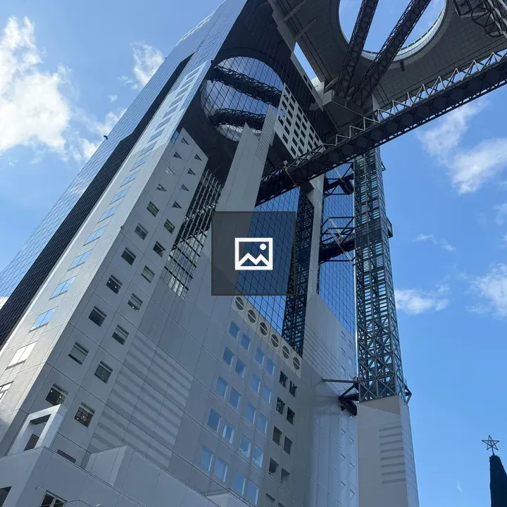 Tall modern building with circular opening