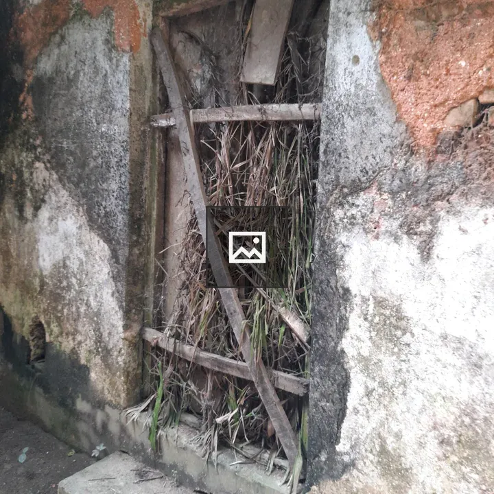 Rustic wall with barred window