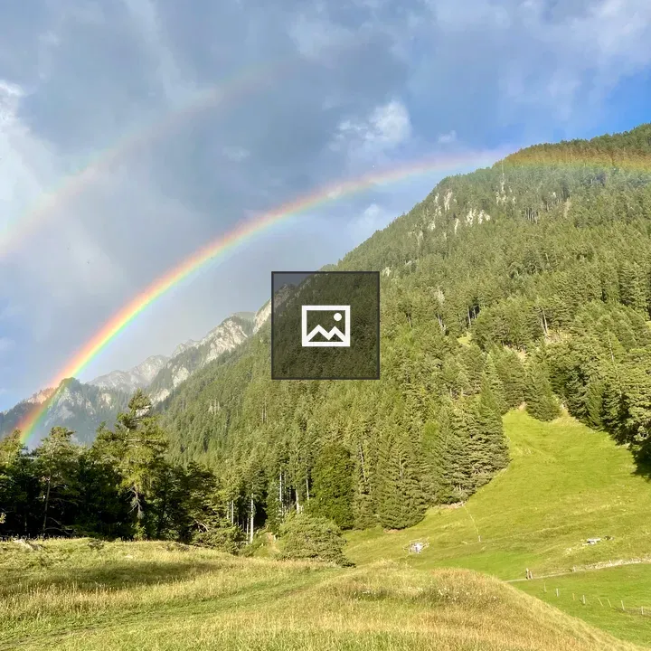 Mountain view with rainbow