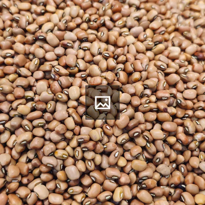 Heap of brown cowpeas in a market