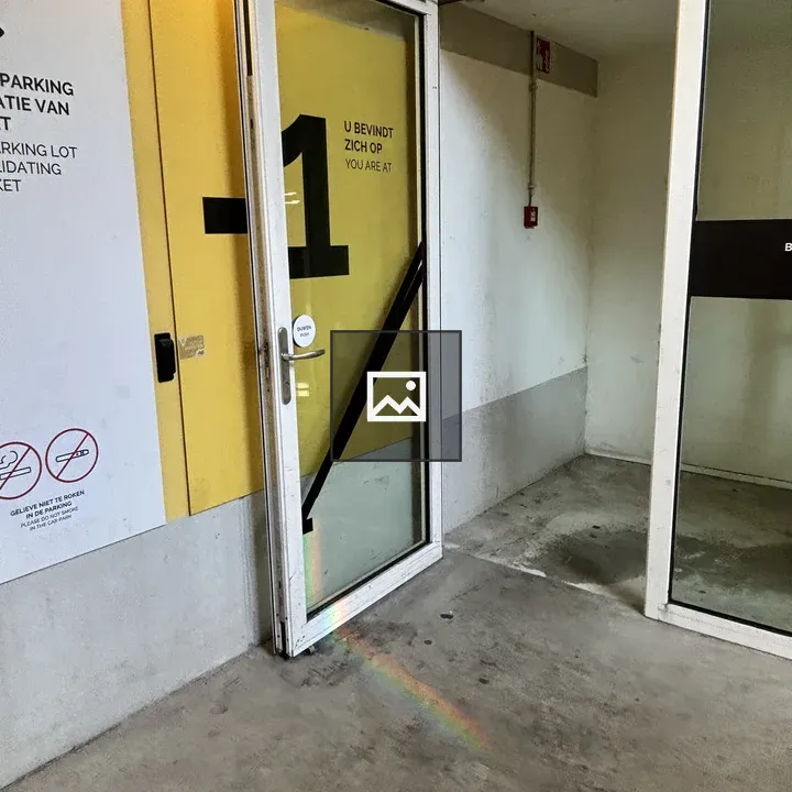 Door reflection in parking lot