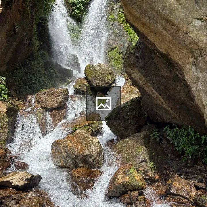 Waterfall with Mossy Rocks