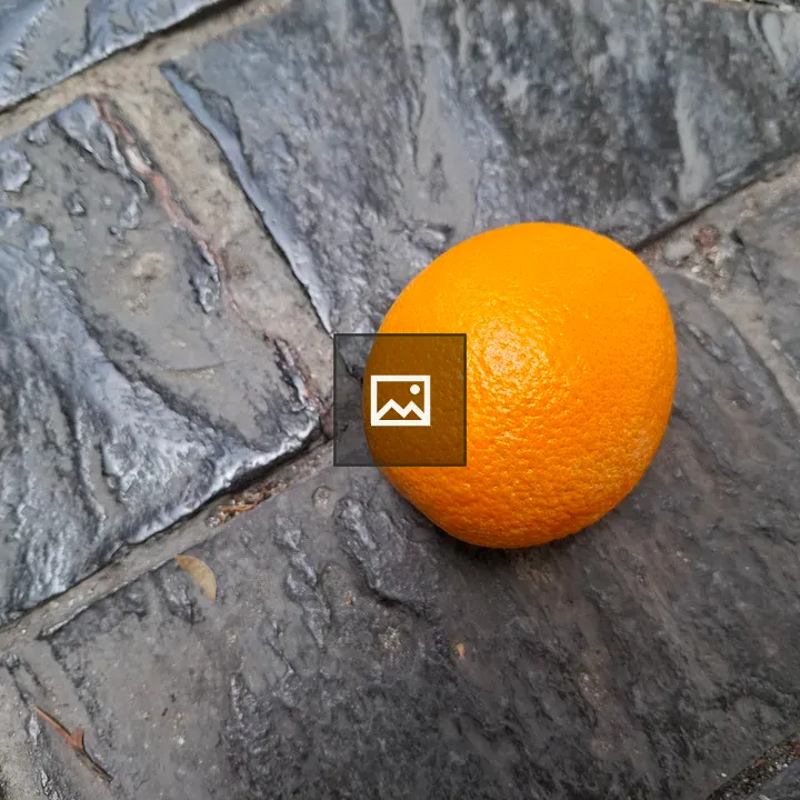 Yellow fruit on gray floor