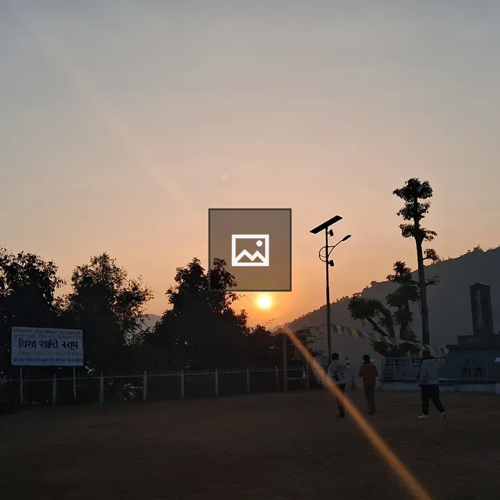 Sunset over hilly landscape