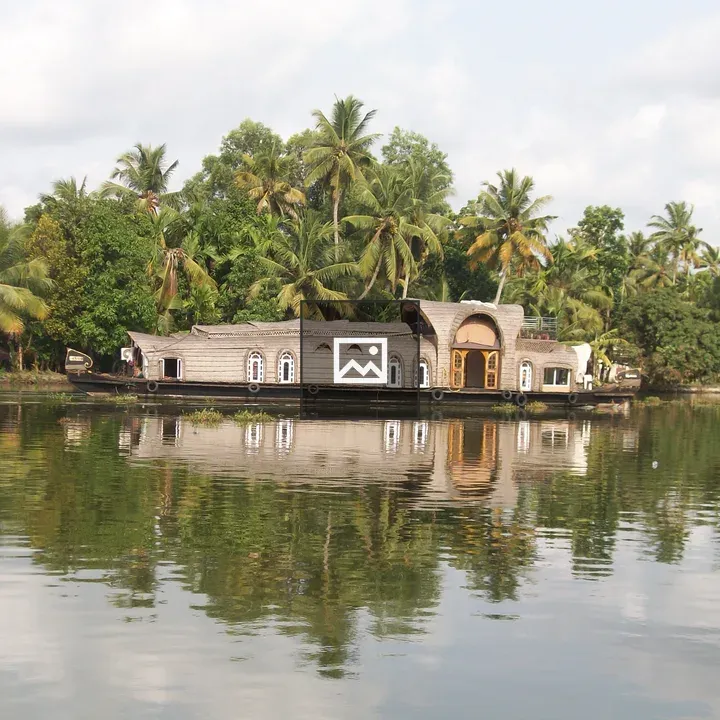 Traditional houseboat on calm river