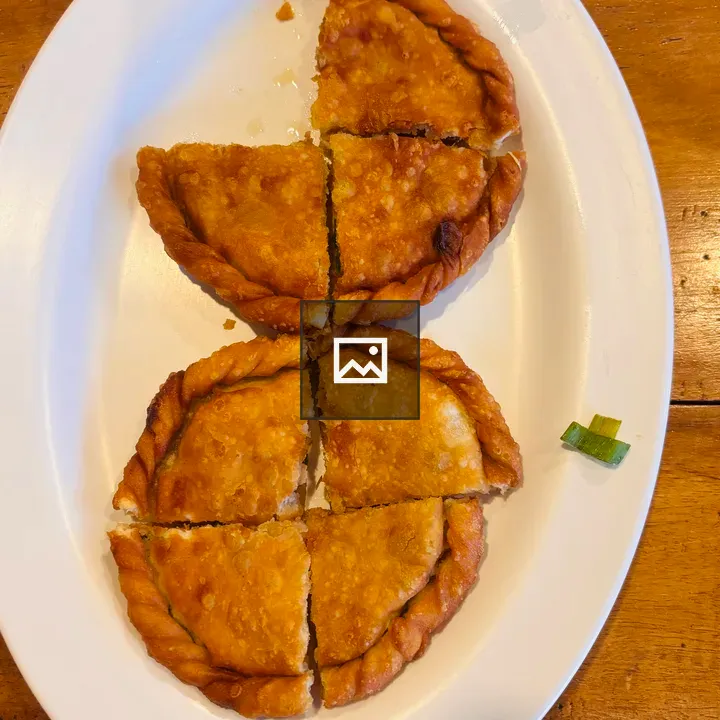 Two empanadas on plate