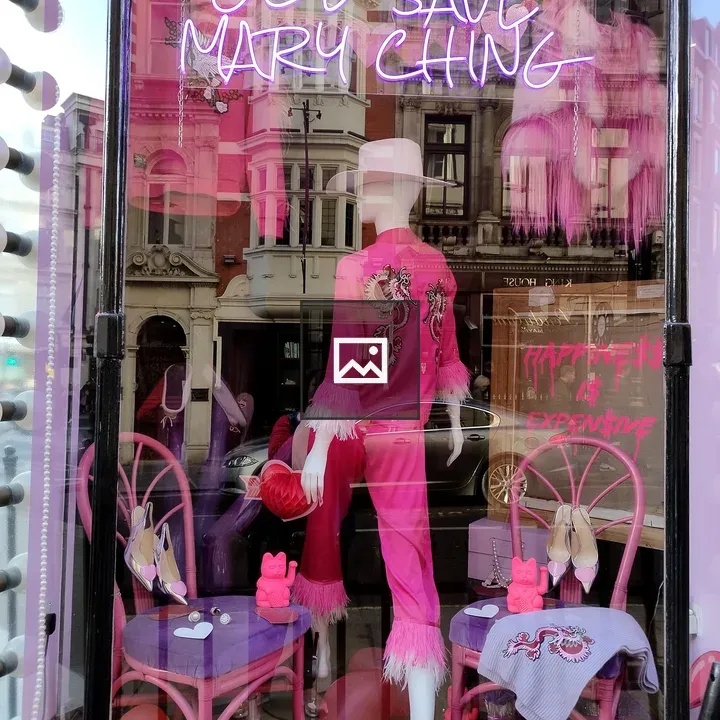Store Window Display with Pink Outfit