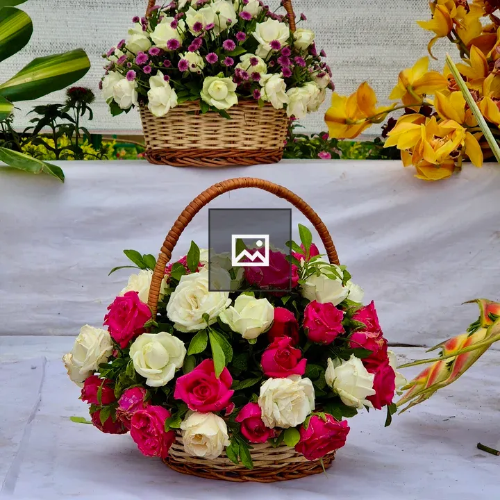 Two woven baskets of roses