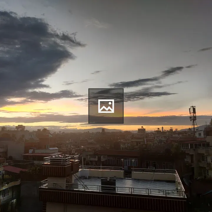 Dawn Over City Rooftops
