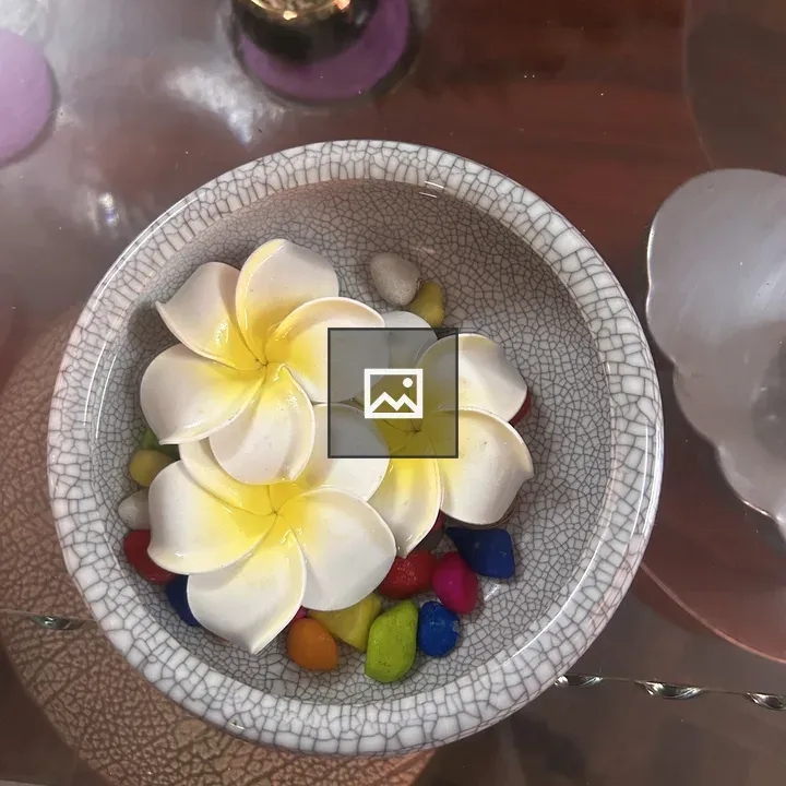 Decorative bowl with artificial flowers