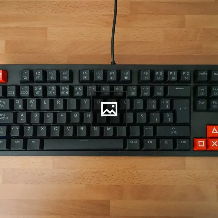 Small gaming keyboard on wood
